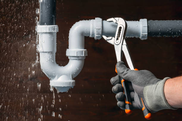 Professional Drain Cleaning technician working in Harvard, IL